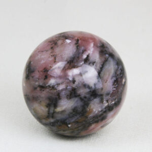 Highly polished and perfectly round pink opal sphere with 43 mm diameter