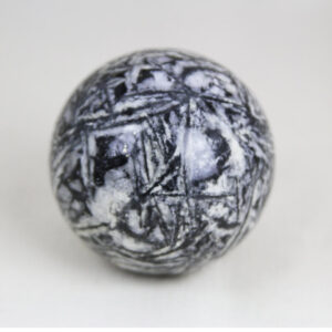 Highly polished and perfectly round sphere made from Canadian Pinolite