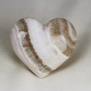 Beautiful heart with perfect shape and superior polish hand-made from fluorescent and phosphorescent Coati Aragonite
