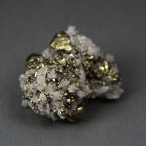Pyrite and quartz crystal cluster from Huanzala mine in Peru