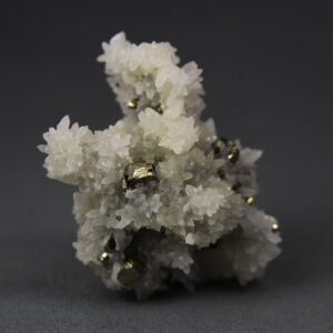 Pyrite and quartz crystal cluster from Huanzala mine in Peru
