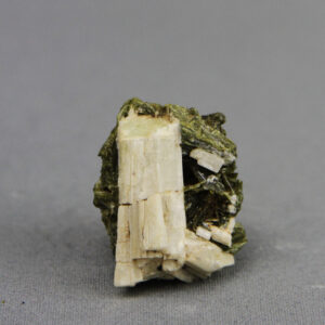fan-shaped epidote crystal cluster with apatite crystal from Gemrocks crystal mining operation in Peru