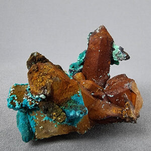 Quartz crystal cluster with chrysocolla and malachite from Tentadora mine Peru